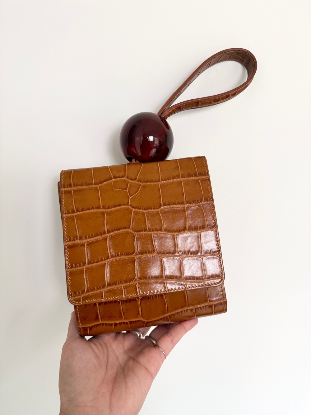 BY FAR Tan Croc-Embossed Wristlet with Deep Cherry Accent